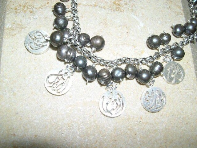 GREY PEARLS AND WORDS OF JUSTICE