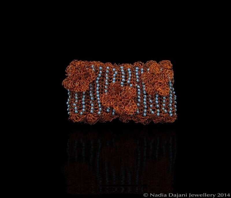 Braided copper bracelet with crochet flowers