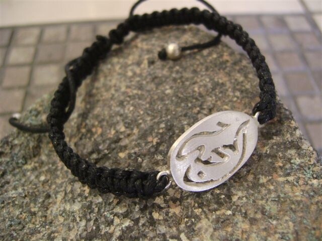 OVAL LOVE BRACELET ON CORD