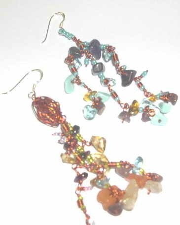 Asymmetric copper shower earrings
