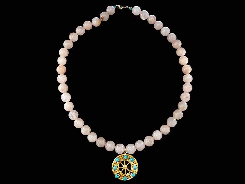 STONE NECKLACE WITH ASSYRIAN WHEEL OF FORTUNE AND STONES