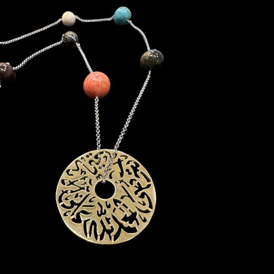 Large Gold Plated Disc with a Long Chain and Gemstones