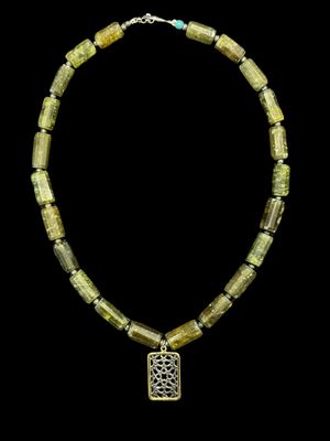 Gemstone necklace with Granada motif with gold plated border