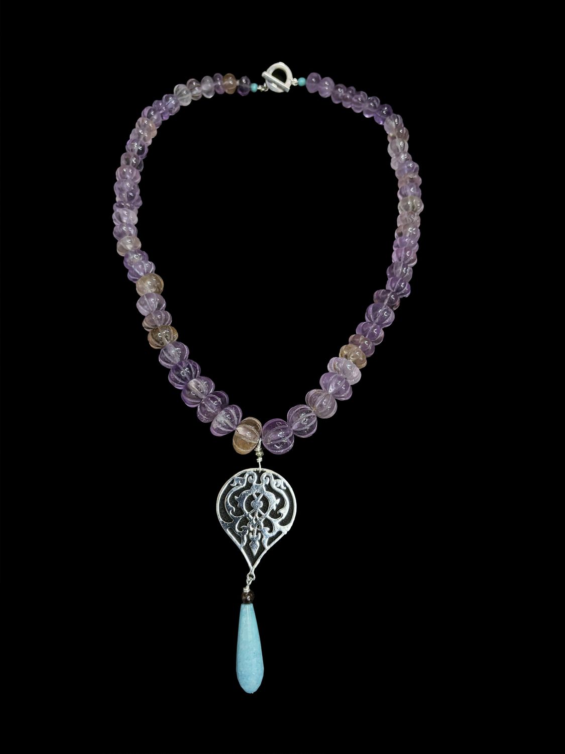 Faceted Amethyst Arabesque Necklace With Calcite Drop