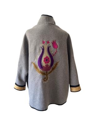The Round Jacket With Aghabani Embroidery in Grey with Gold Cuffs and Purple Tulip Embroidery on the Back