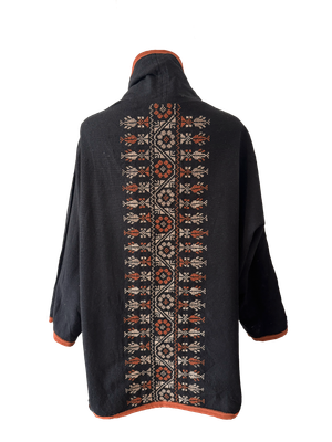 The Round Jacket in Black With Dark Orange Trim and Hand Embroidery