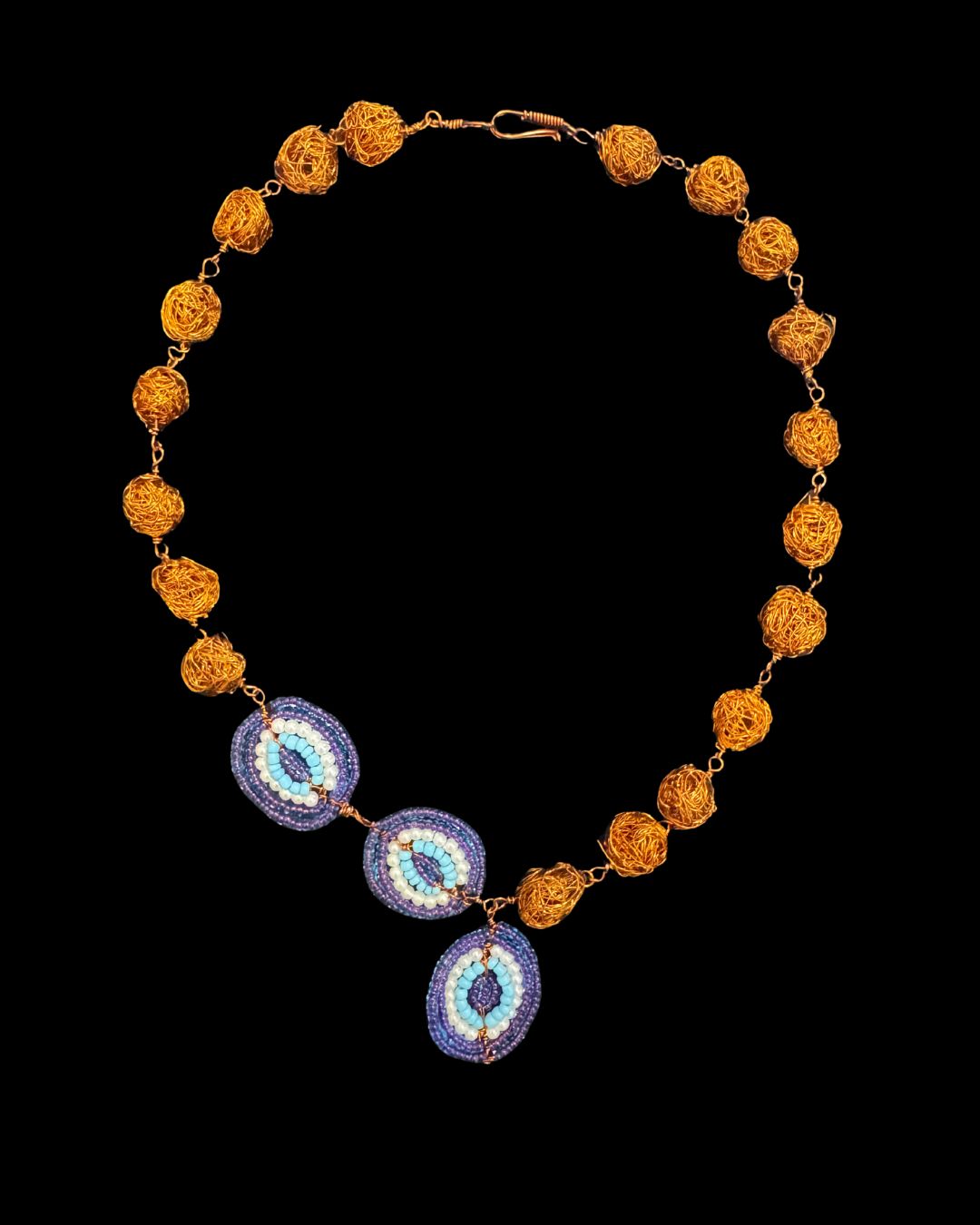 Copper bead necklace with Evil eye motif