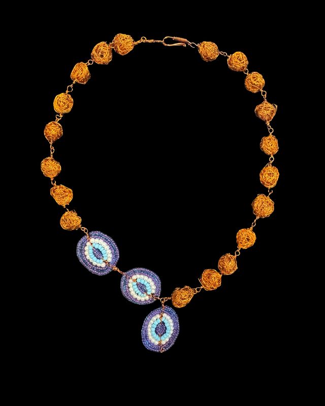 Copper bead necklace with Evil eye motif