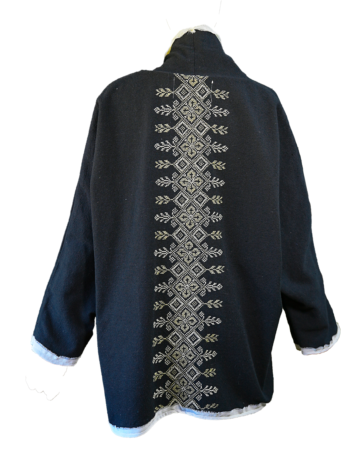 The Round Jacket in Black With White Trim and Hand Embroidery