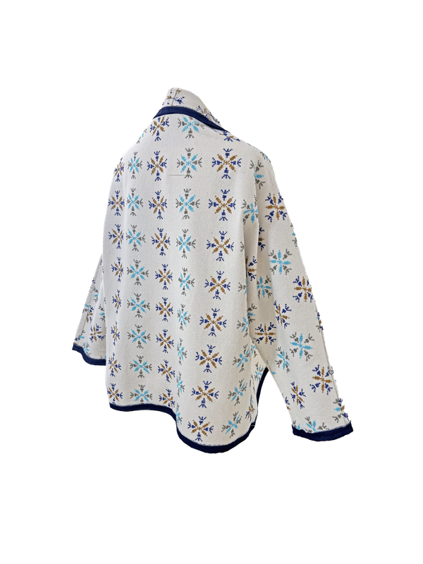 The Heavily Embroidered Round Jacket in White with Navy Trim