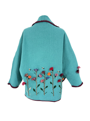 Nadia Dajani x UNHCR Abstract Floral Round Jacket in Turquoise with Tassels and Burgundy Trim