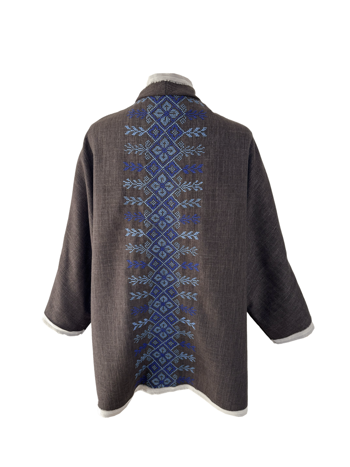 The Round Jacket in Brown With White Trim and Blue Hand Embroidery