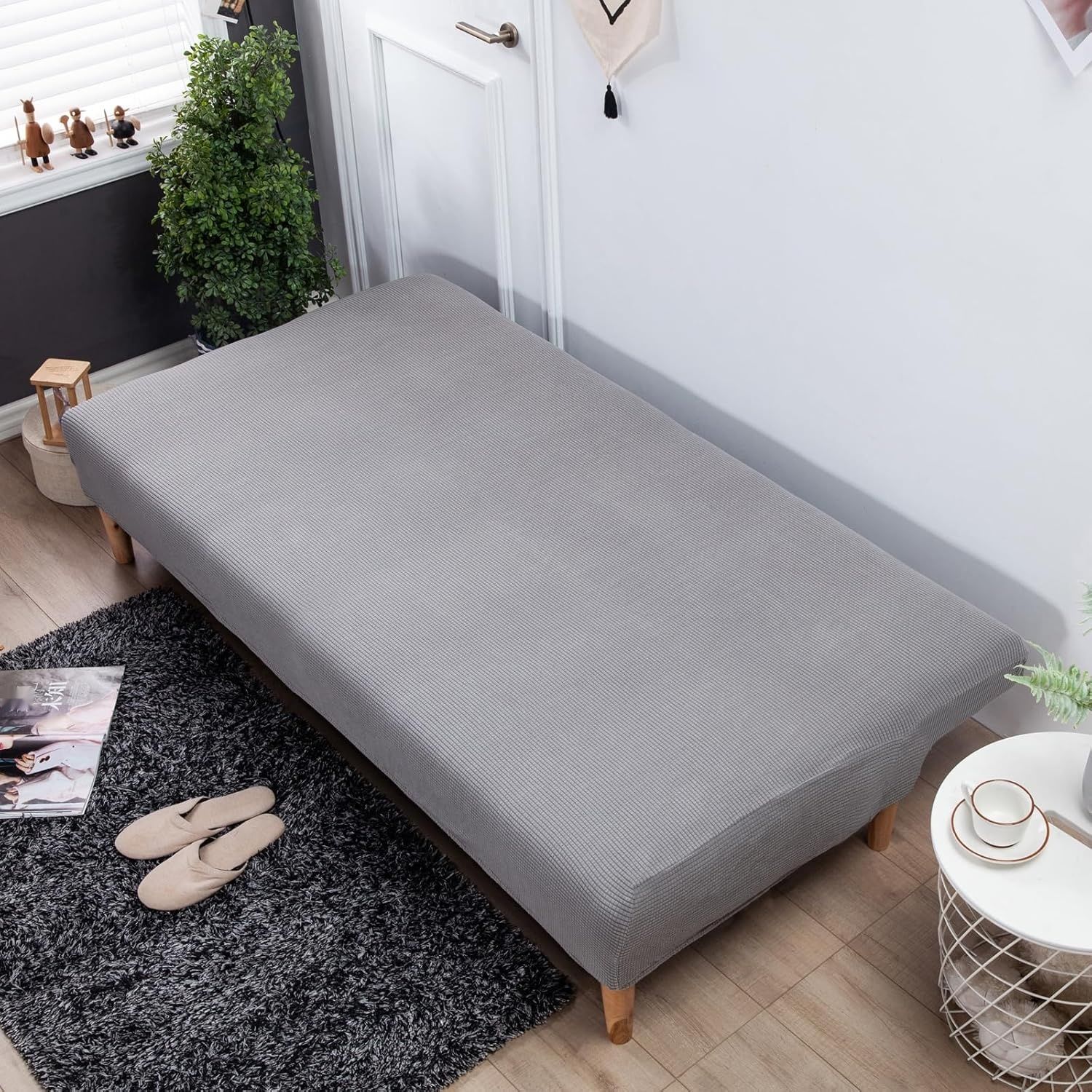 Pokrowiec na sofę bez podłokietników Carvapet (Dove Grey)