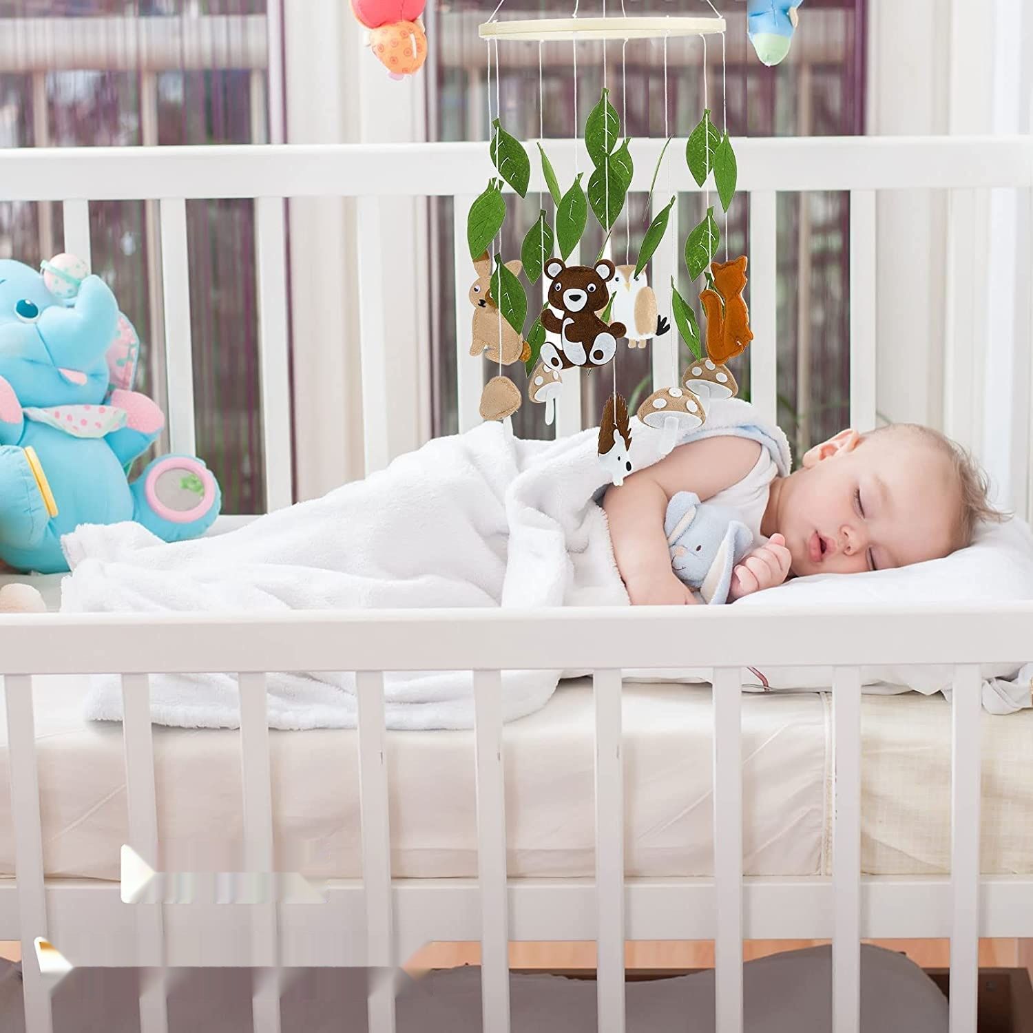 Dzwonek mobilny do łóżeczka z filcu dla niemowląt.