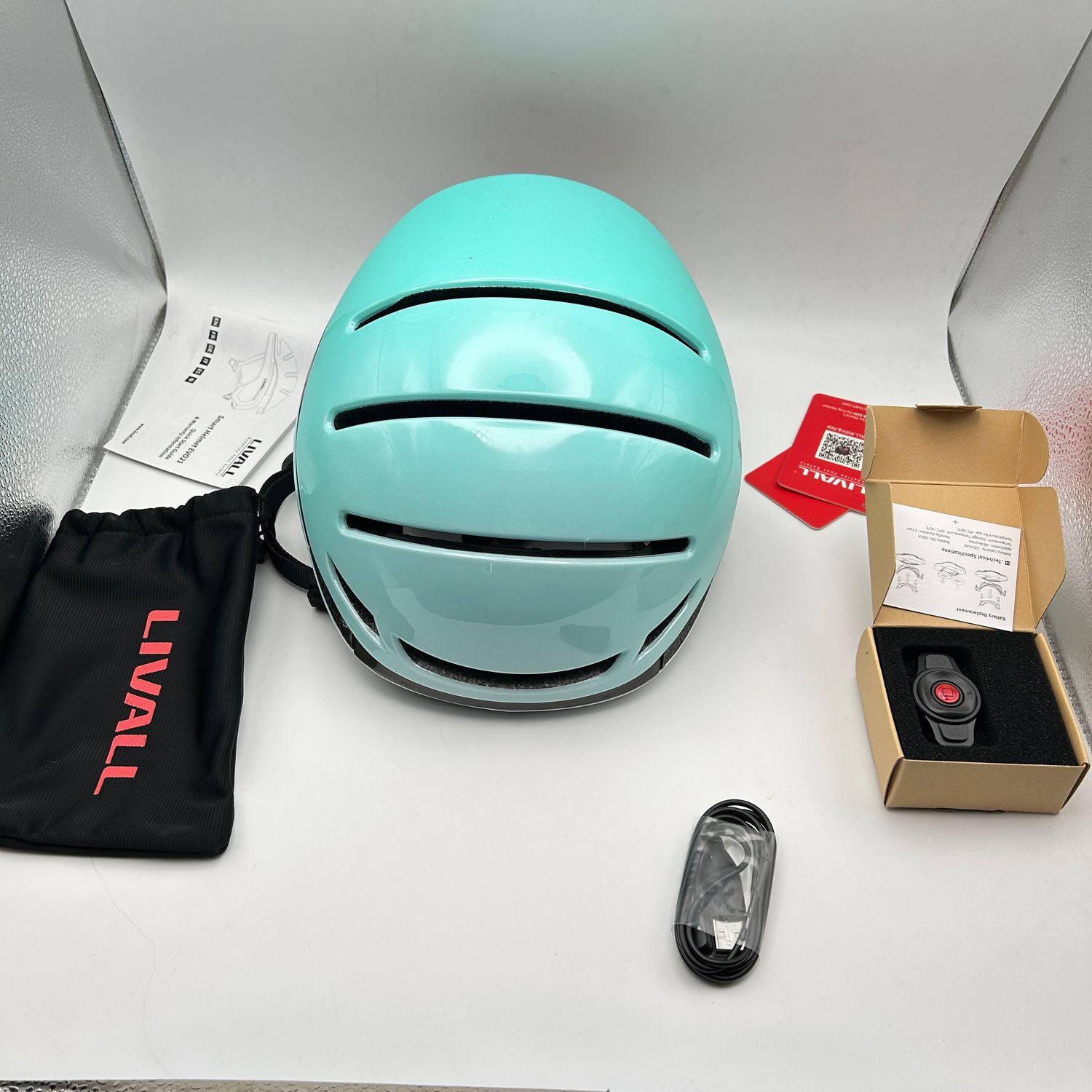 LIVALL Inteligentny Kask Rowerowy z Bluetooth, światłami i alarmem SOS. miętowy, M (54-58 cm)