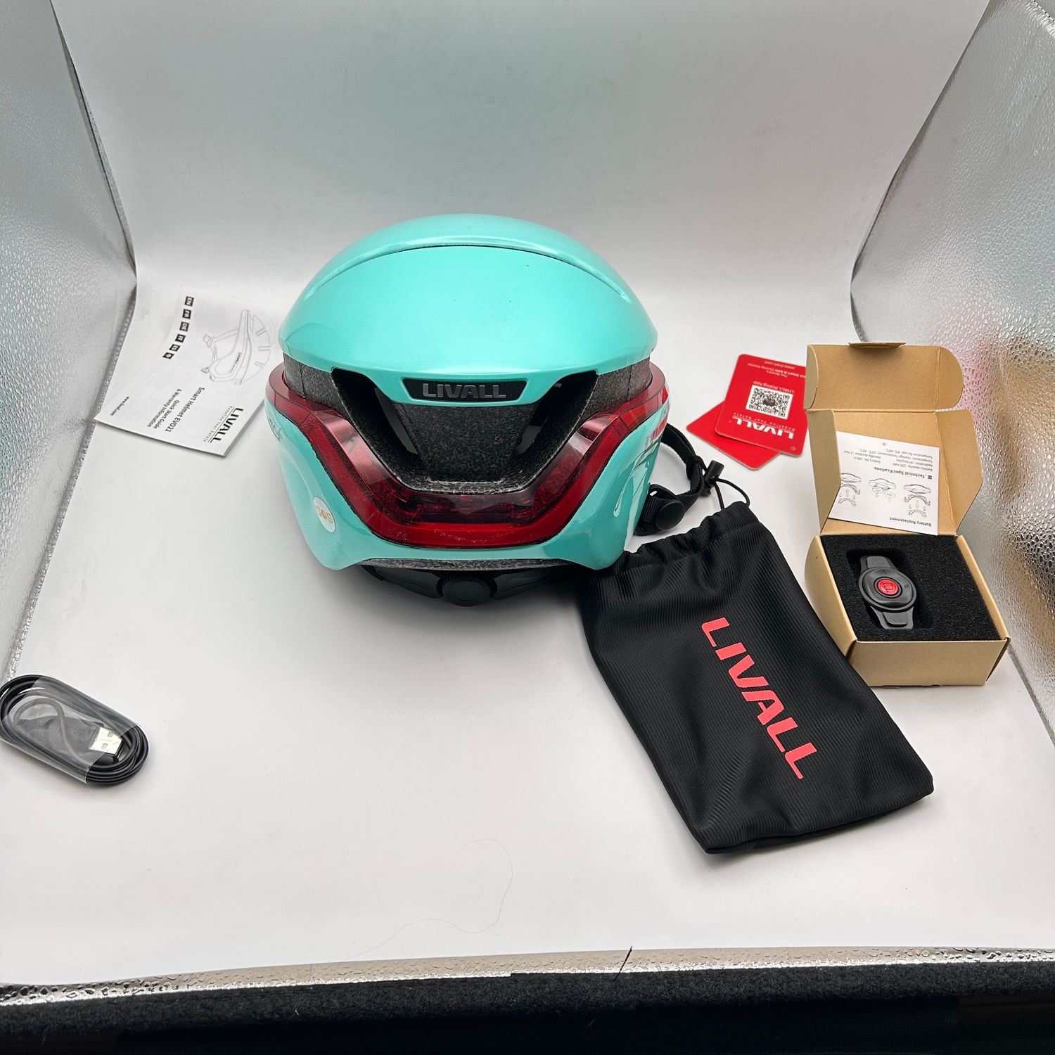 LIVALL Inteligentny Kask Rowerowy z Bluetooth, światłami i alarmem SOS. miętowy, M (54-58 cm)