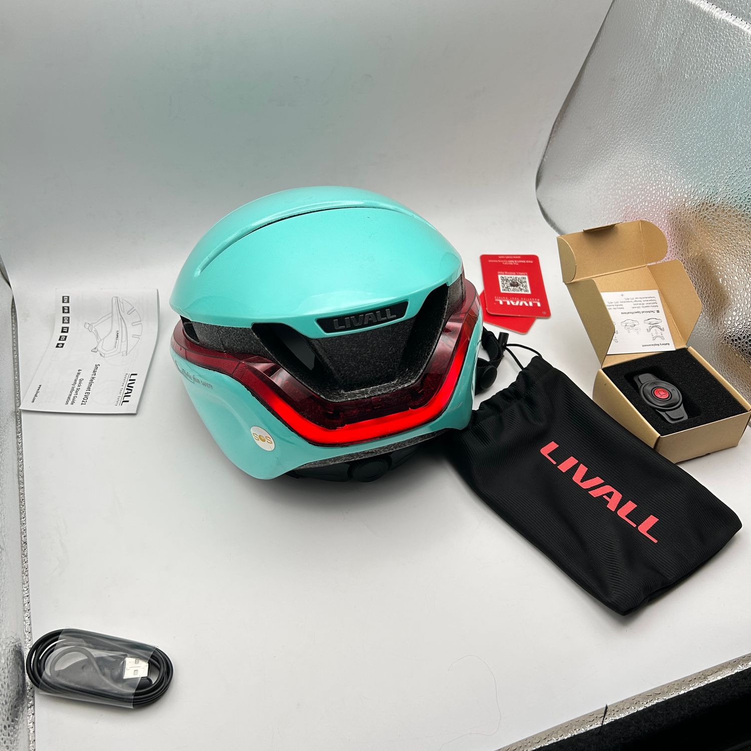 LIVALL Inteligentny Kask Rowerowy z Bluetooth, światłami i alarmem SOS. miętowy, M (54-58 cm)