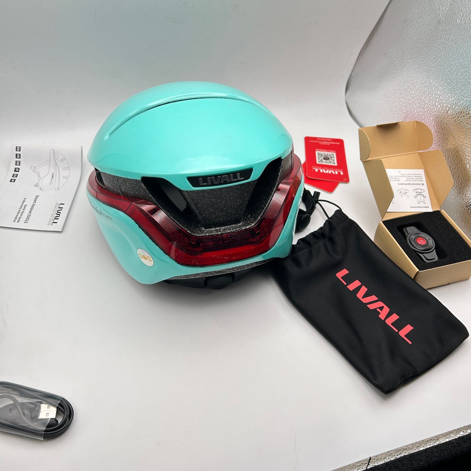 LIVALL Inteligentny Kask Rowerowy z Bluetooth, światłami i alarmem SOS. miętowy, M (54-58 cm)