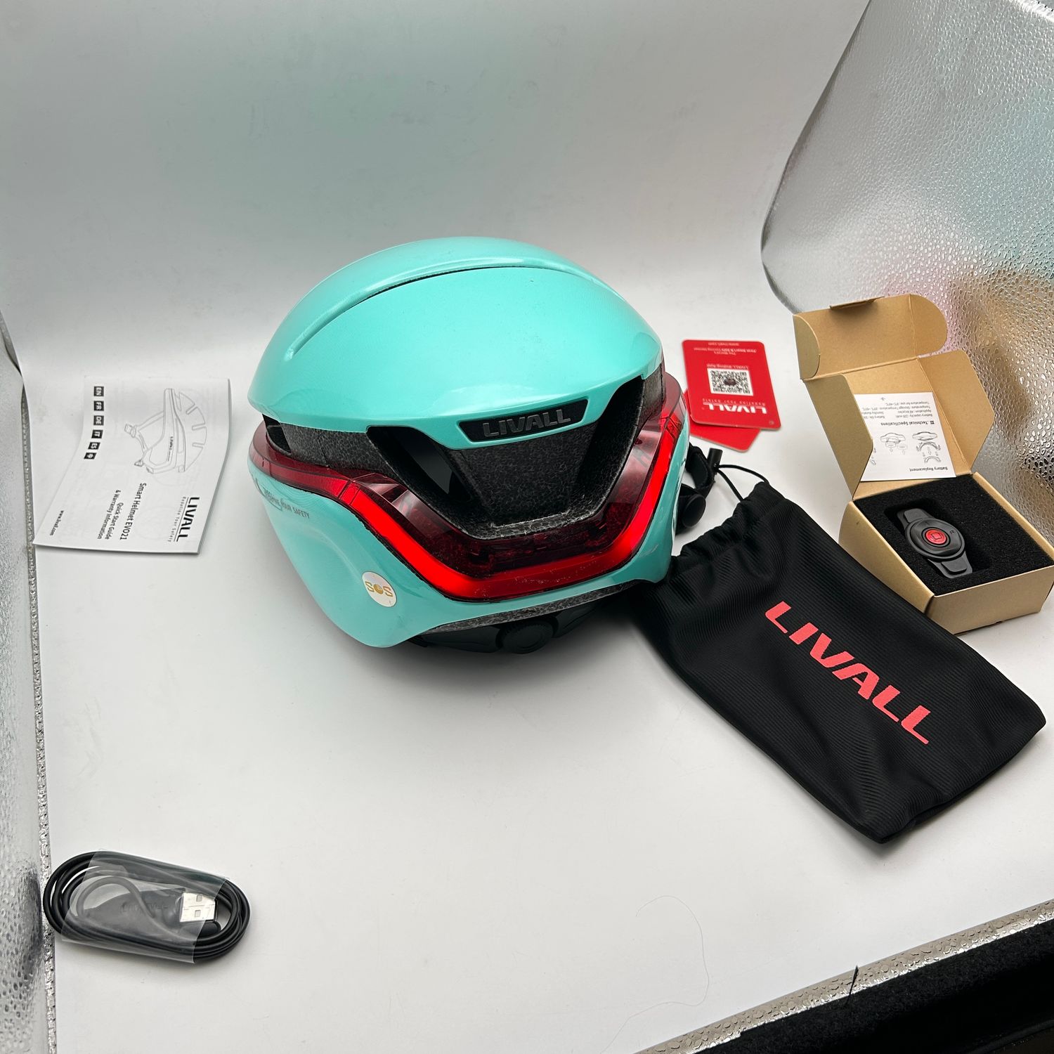 LIVALL Inteligentny Kask Rowerowy z Bluetooth, światłami i alarmem SOS. miętowy, M (54-58 cm)