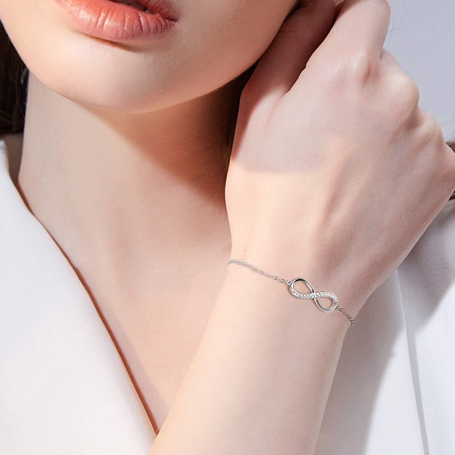 Damska bransoletka z cyrkonią, srebro 925, symbol nieskończoności.