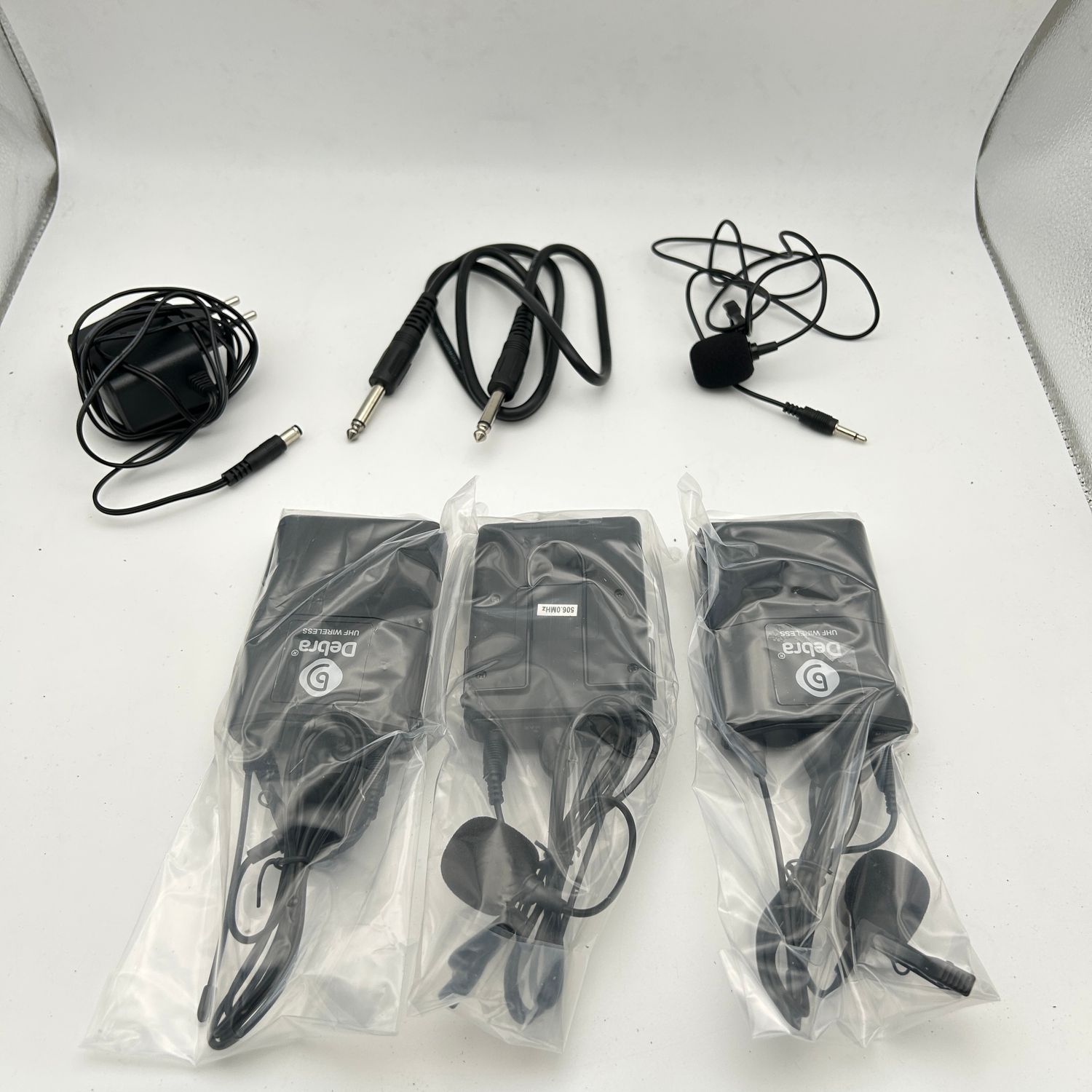 Debra Audio Pro System UHF 4-kanałowy, mikrofony, odbiornik, 4 nadajniki.