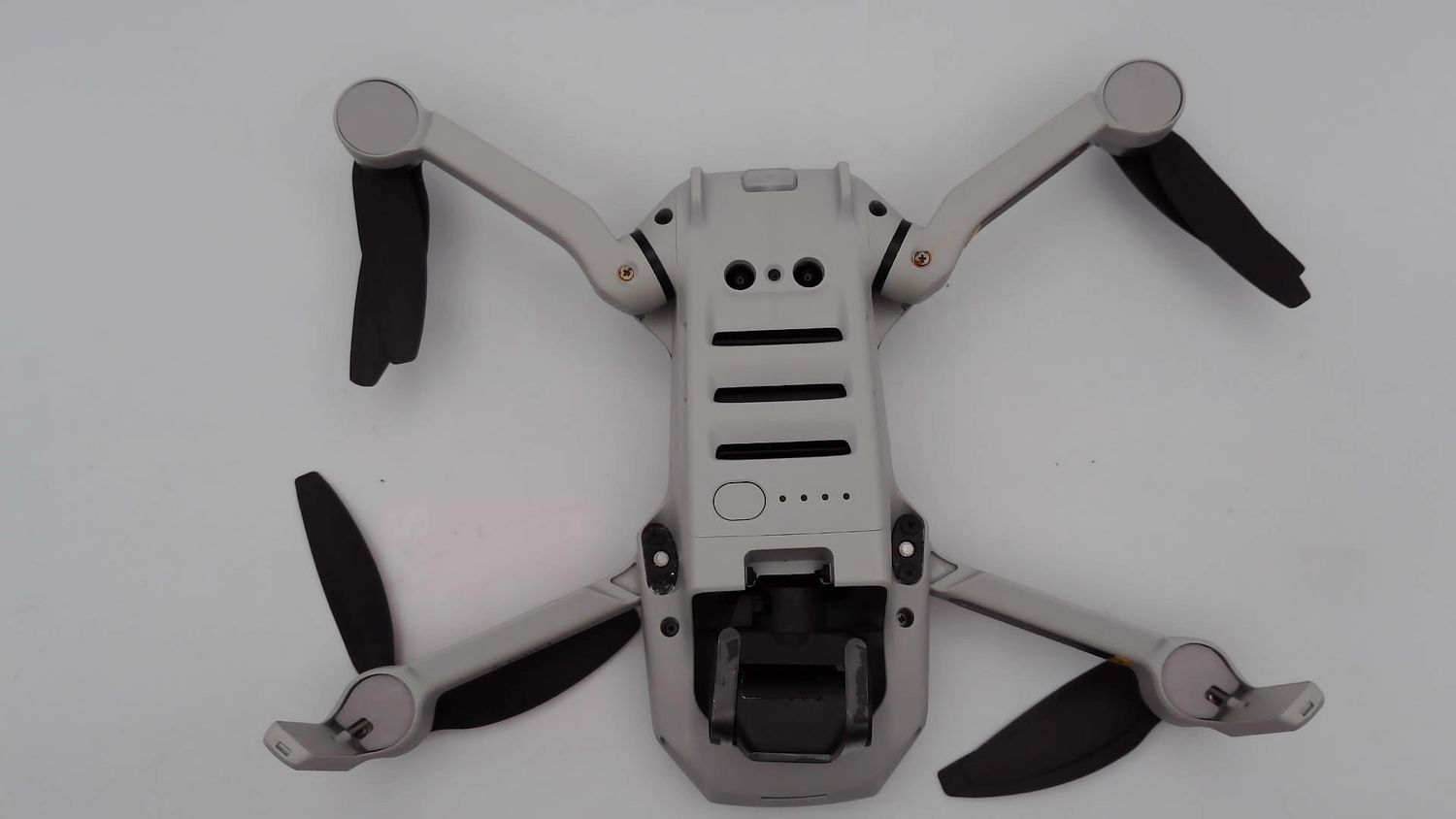 DJI Mini 2 – lekki, składany dron z kamerą 4K - uszkodzony