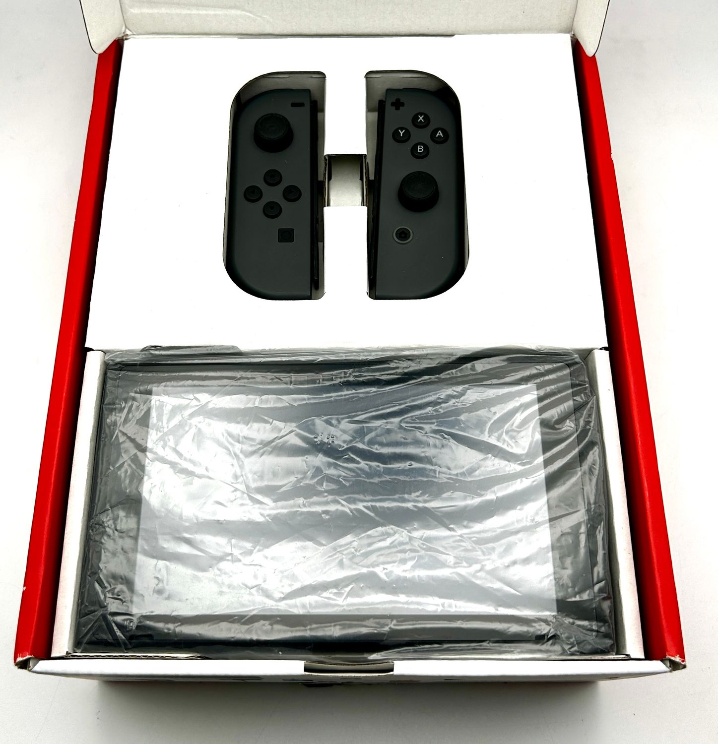 Nintendo Switch z Joy-Con Neon Czerwony i Neon Niebieski
