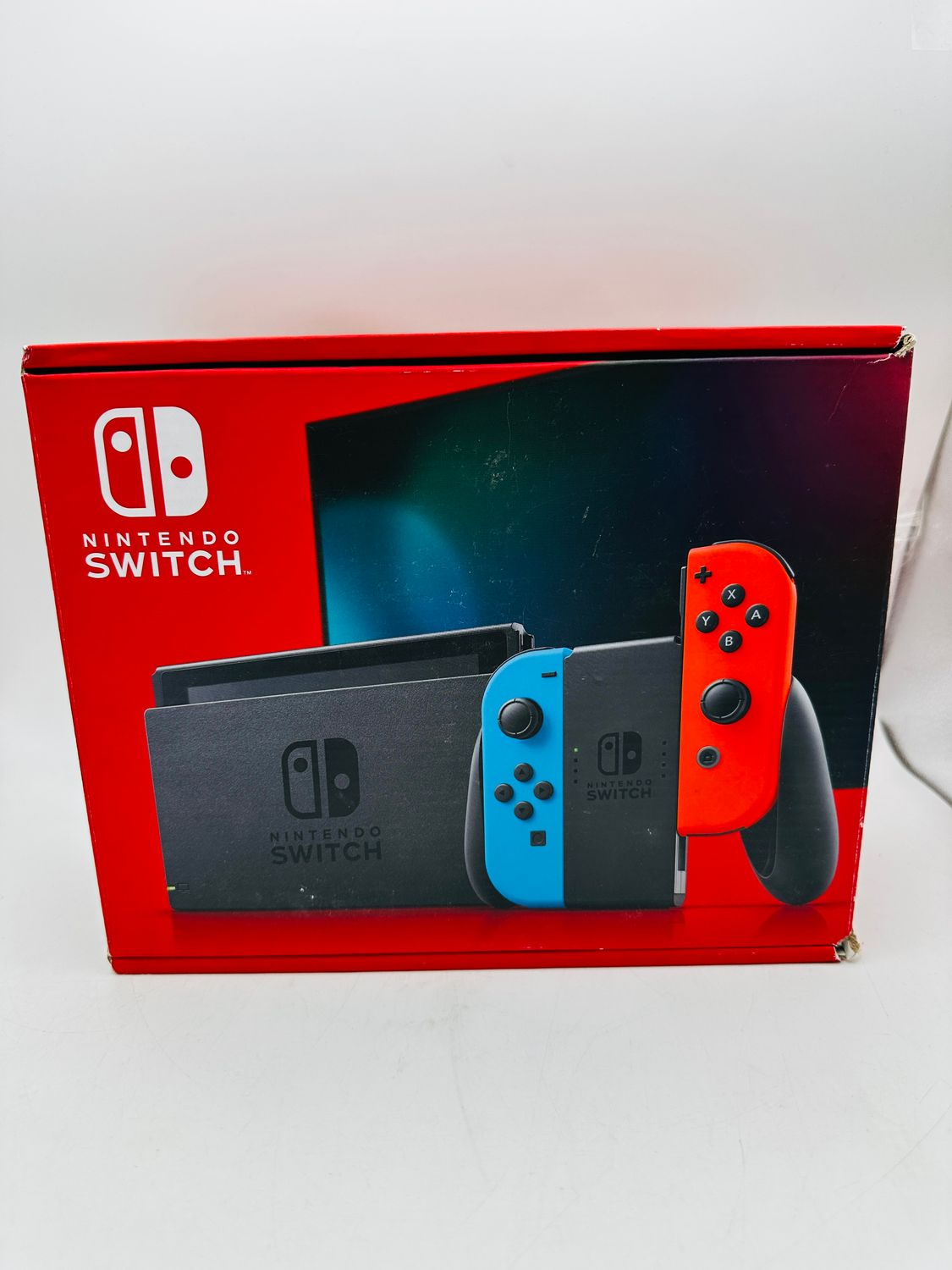 Nintendo Switch z Joy-Con Neon Czerwony i Neon Niebieski – używany, niekompletny