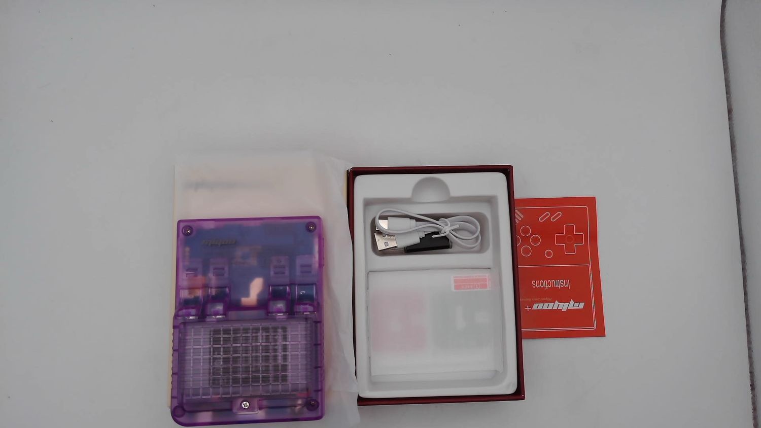 Miyoo Mini Plus Viola Trasparente 128GB z Onion OS – uszkodzony
