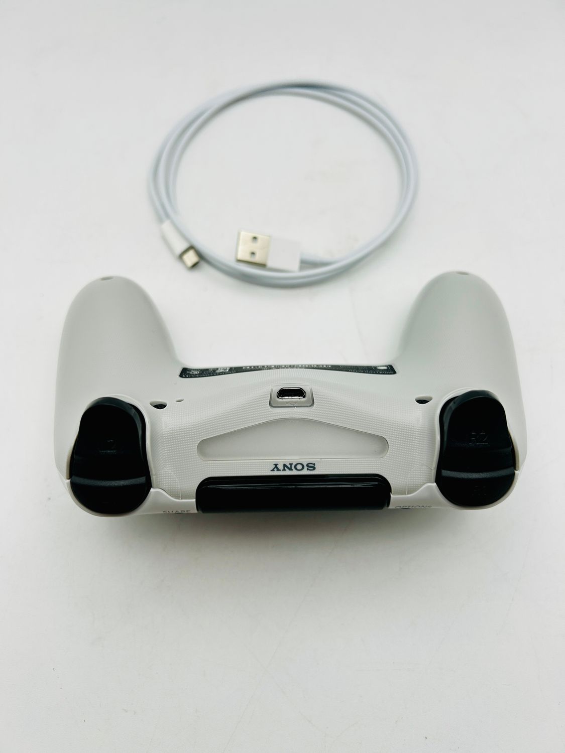 Kontroler Sony PlayStation DualShock 4 – Glacier White (Odnowiony)