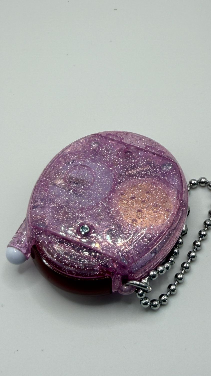 Tamagotchi Connection Pink Glitter – interaktywne wirtualne zwierzątko