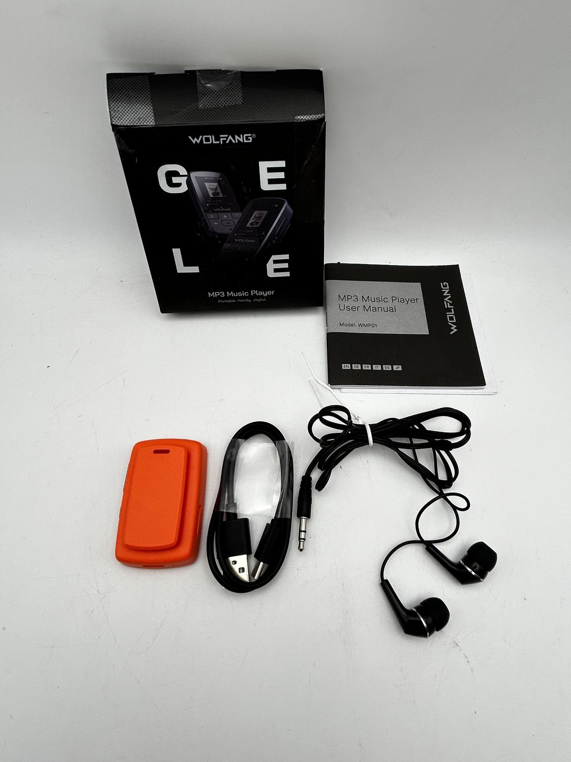 Odtwarzacz MP3 WOLFANG WMP01 Bluetooth 5.2 radio FM klips pomarańczowy