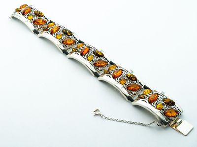 Bernstein Armband mit Silber 925 und Kautschukband