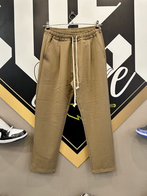 Pantalone elegante fondo largo marrone