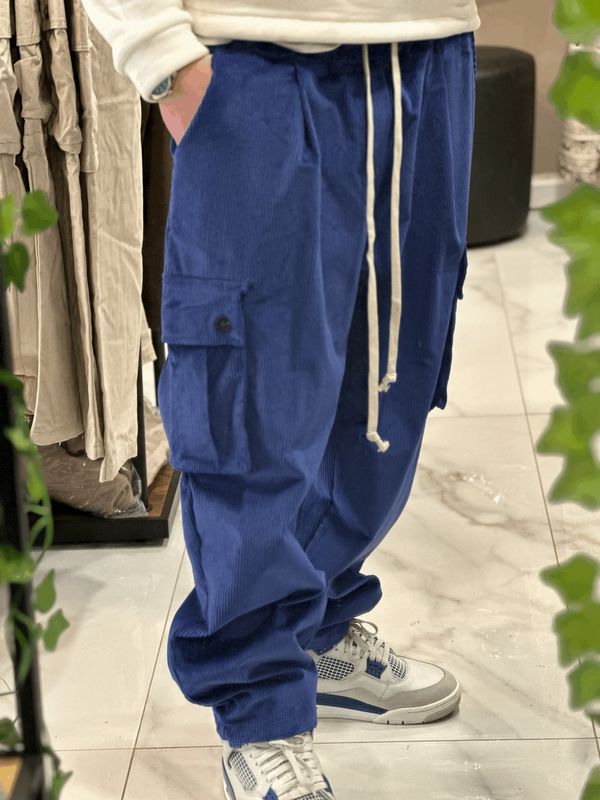 Pantalone sartoriale a costine oversize con tasconi fondo largo