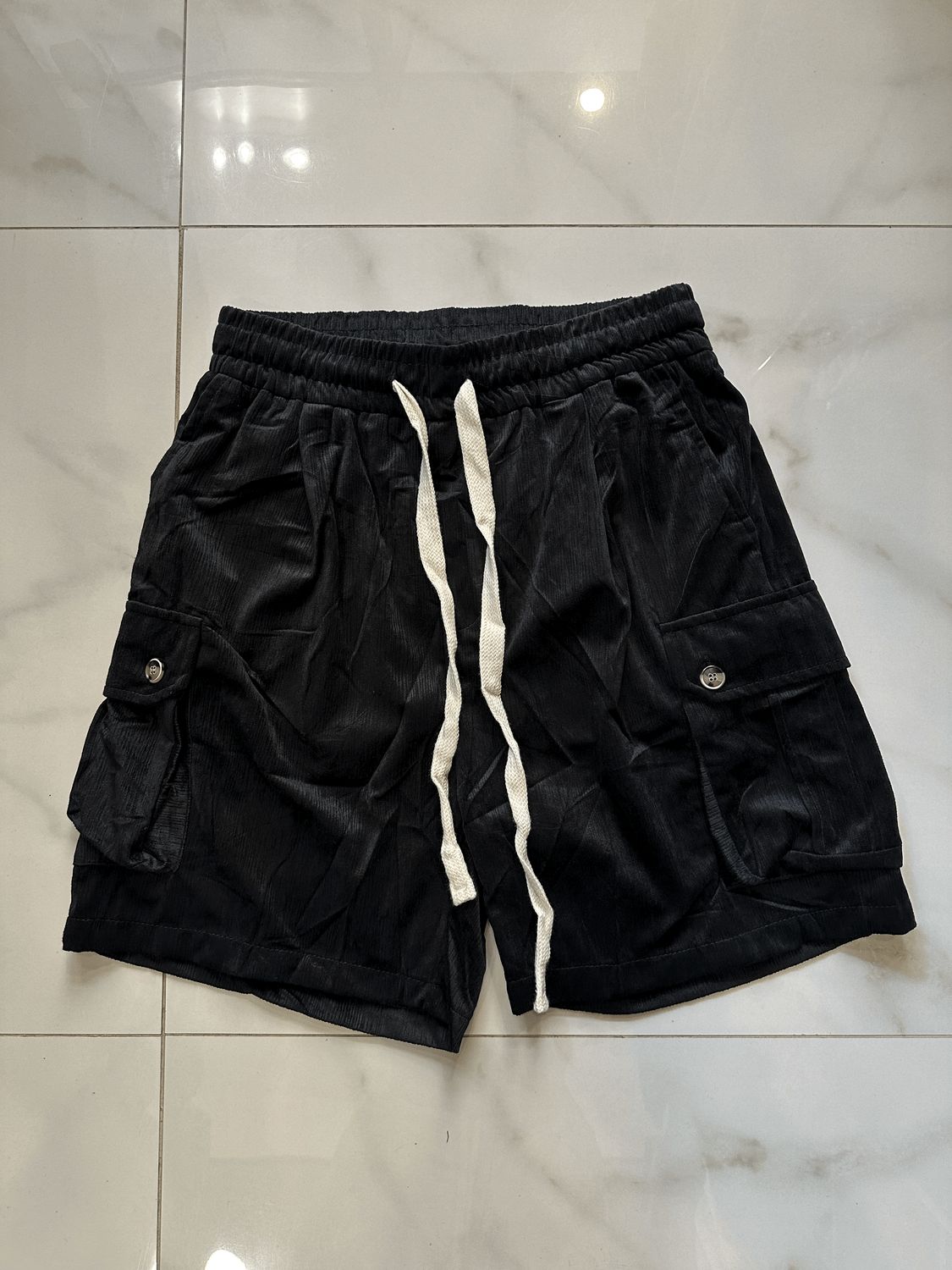 Pantaloncini a costine ricamati con tasconi nero