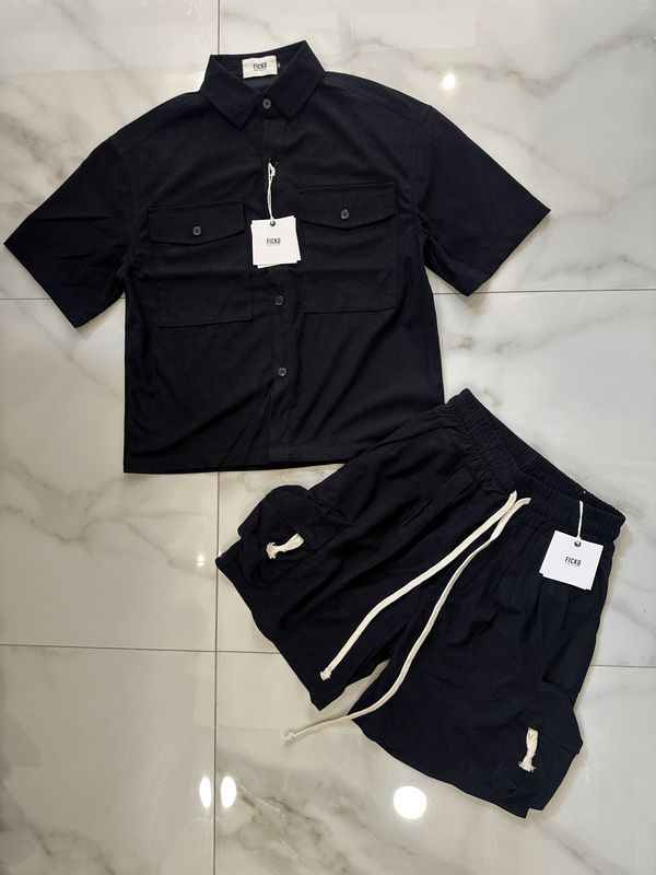 Completo a costine oversize nero con tasconi camicia e pantaloncini