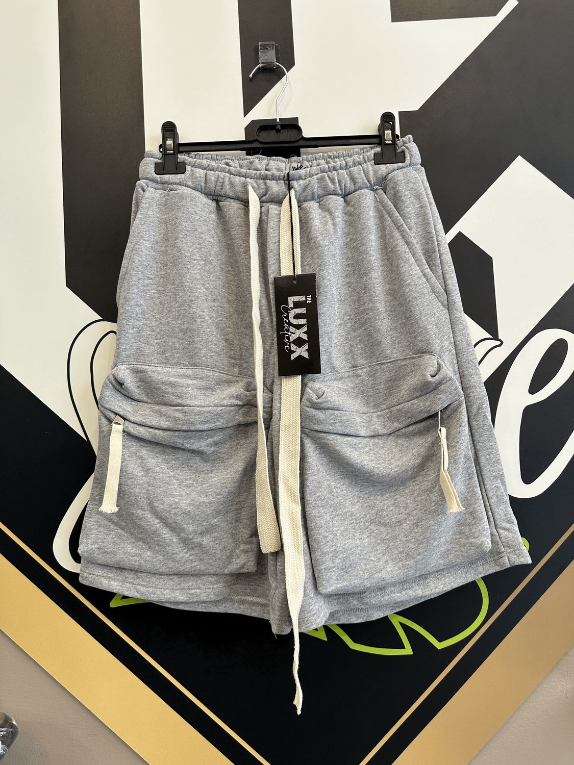 Pantaloncini tuta di cotone con tasconi frontali grigio