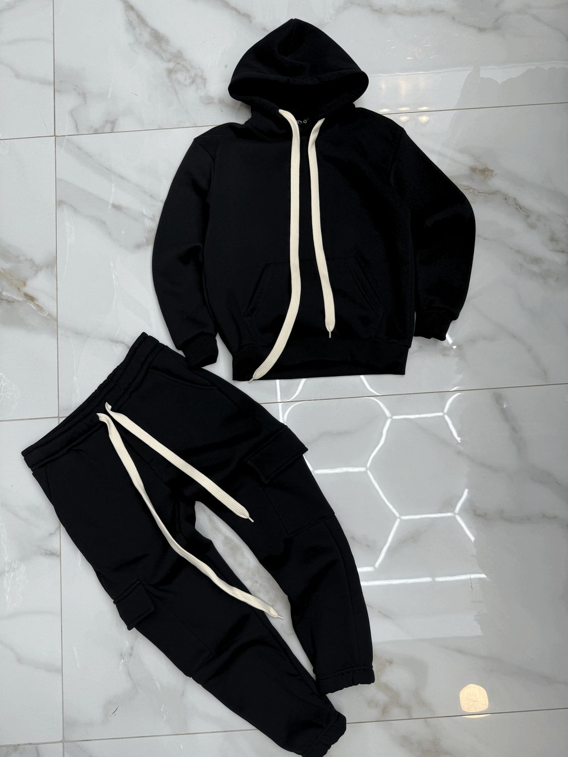 Tuta Completa boxy fit felpata BAMBINO tinta unita nera