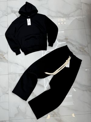 Tuta completa boxy fit felpata made in italy nero fondo largo