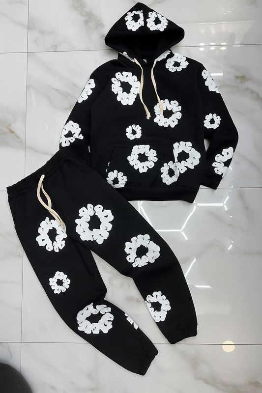 Tuta Completa boxy fit felpata BAMBINO con fiori nera