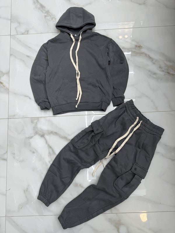 Tuta Completa boxy fit felpata BAMBINO tinta unita grigio piombo Tuta Completa boxy fit felpata BAMBINO tinta unita grigio piombo