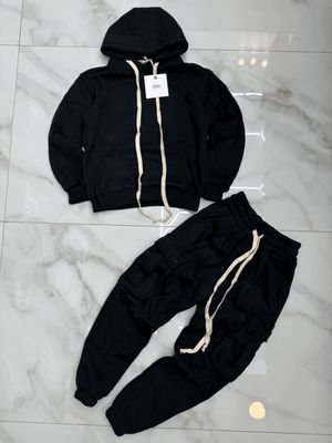 Tuta Completa boxy fit felpata BAMBINO tinta unita nero Tuta Completa boxy fit felpata BAMBINO tinta unita nero