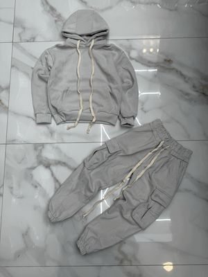 Tuta Completa boxy fit felpata BAMBINO tinta unita grigio perla Tuta Completa boxy fit felpata BAMBINO tinta unita grigio perla