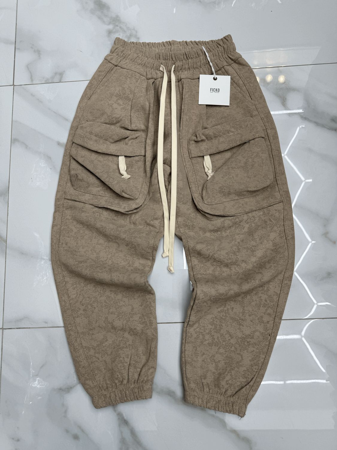 Pantaloni sartoriali ricamati cargo zip BAMBINO beige polsino Pantaloni sartoriali ricamati cargo zip BAMBINO beige polsino