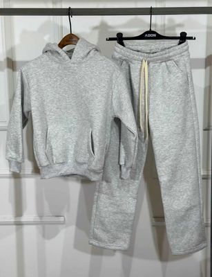 Tuta completa oversize fondo largo felpata BAMBINO grigio nk Tuta completa oversize fondo largo felpata BAMBINO grigio nk