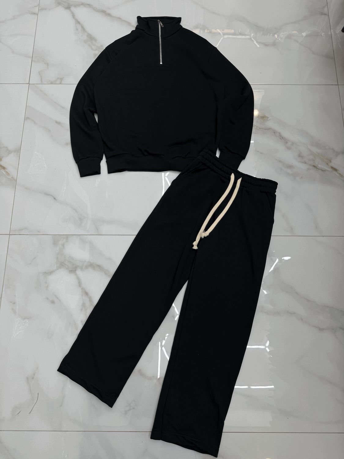 tuta completa mezza zip fondo largo BAMBINO nera