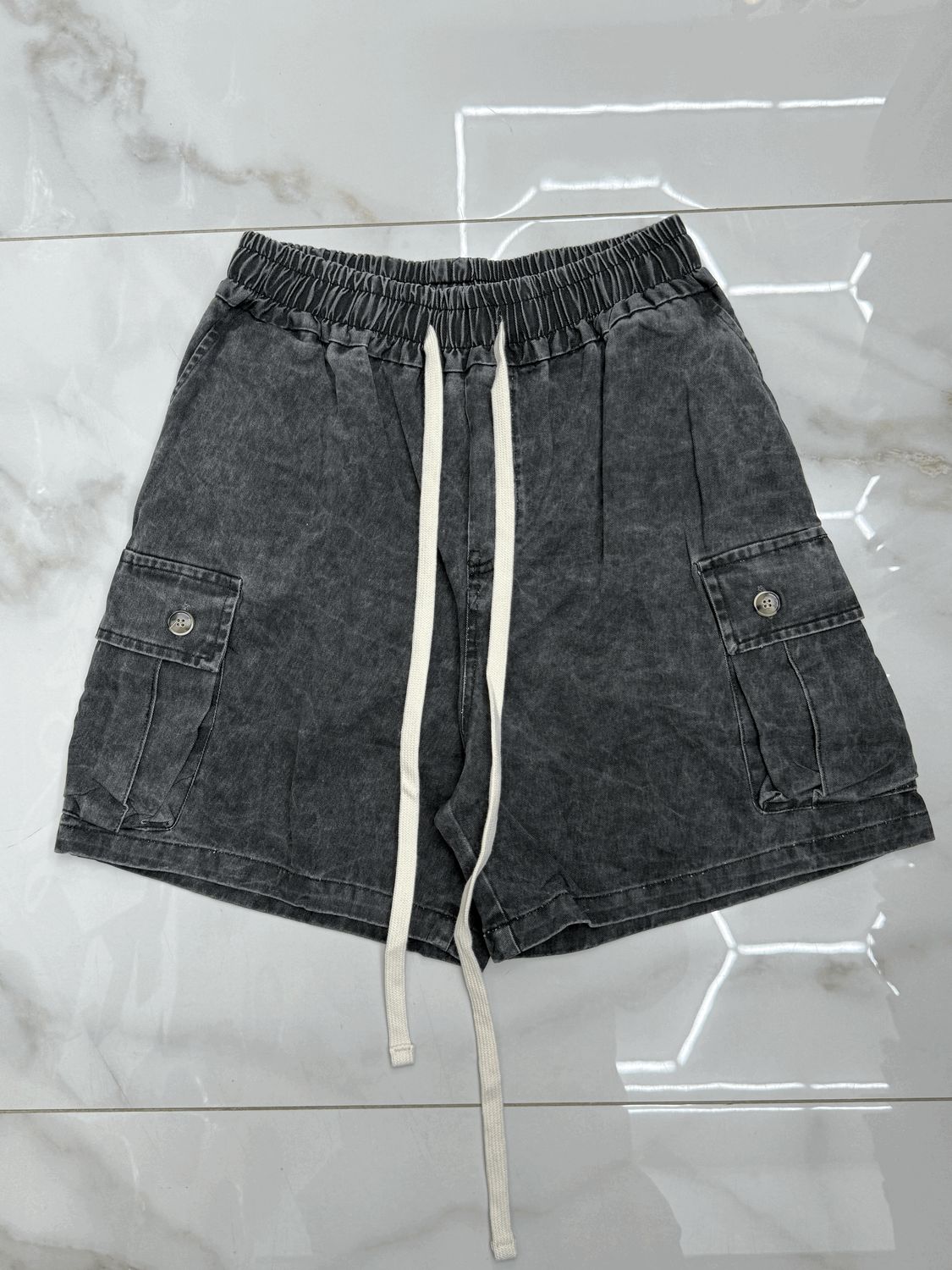 Pantaloncini oversize premium BAMBINO tasconi laterali nero effetto jeans Pantaloncini oversize premium BAMBINO tasconi laterali nero effetto jeans