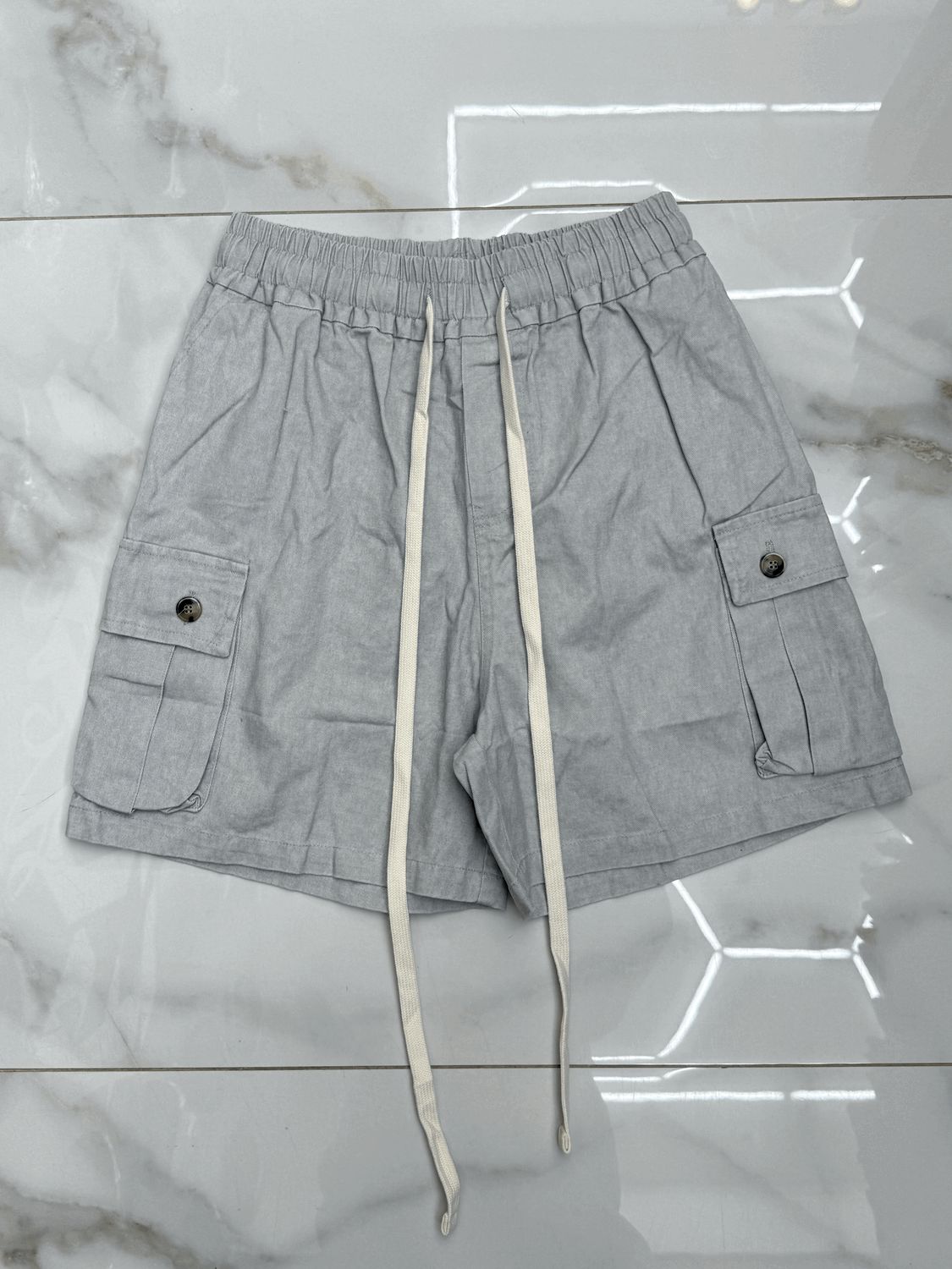 Pantaloncini oversize premium BAMBINO tasconi laterali grigio perla  effetto jeans