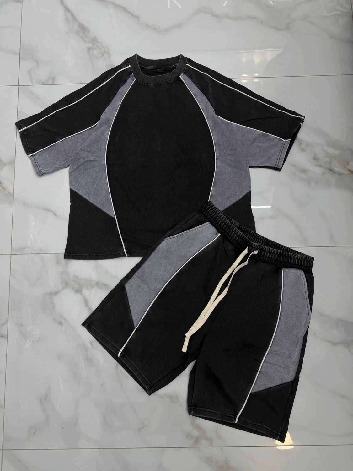 Completo corto oversize stone wash nero